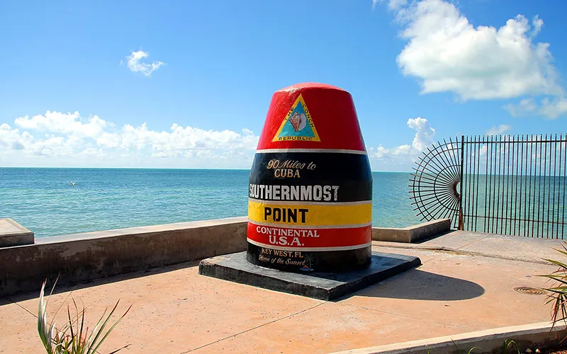 Southernmost Point buoy in Key West with ocean in the background